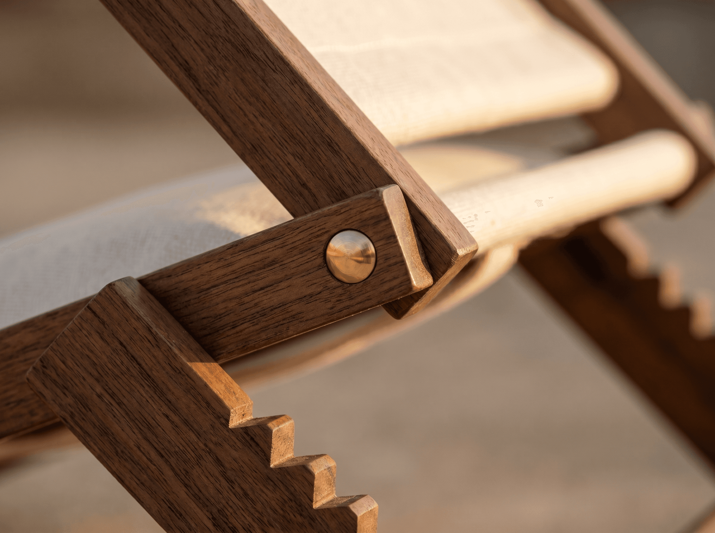 Brass pivot pin and notched recline detail